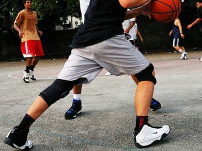 basketball player with knee brace
