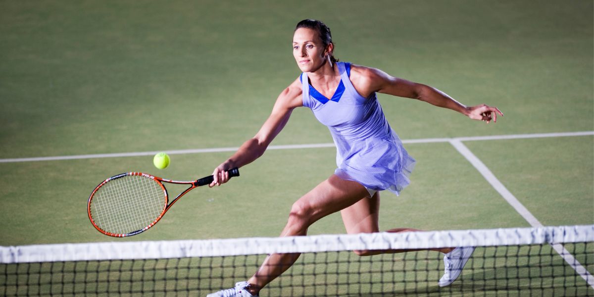 Woman playing Tennis